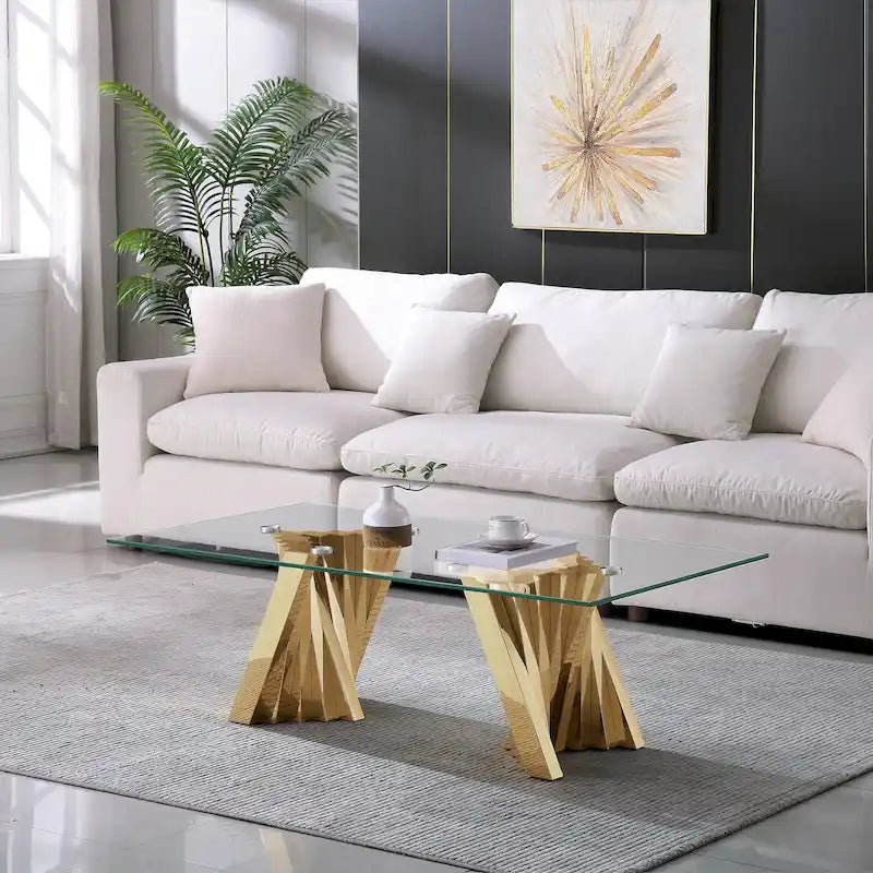 Table basse avec plateau en verre trempé et piètement en acier inoxydable finition miroir doré