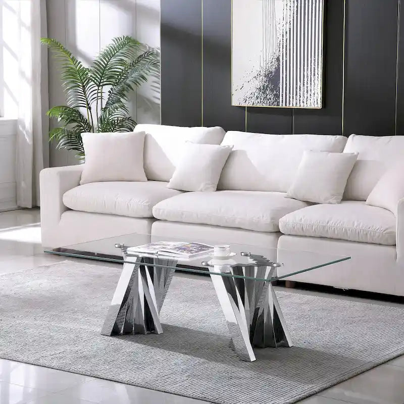 Table basse avec plateau en verre trempé et piètement en acier inoxydable finition miroir doré
