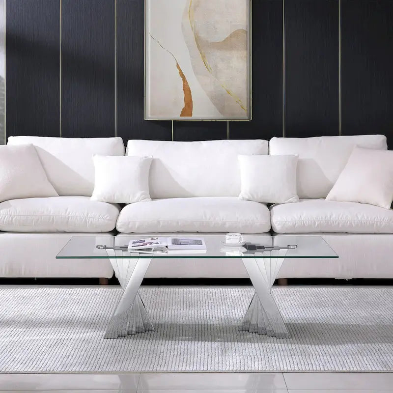 Table basse avec plateau en verre trempé et piètement en acier inoxydable finition miroir doré