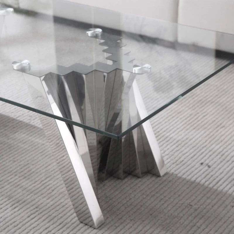 Table basse avec plateau en verre trempé et piètement en acier inoxydable finition miroir doré