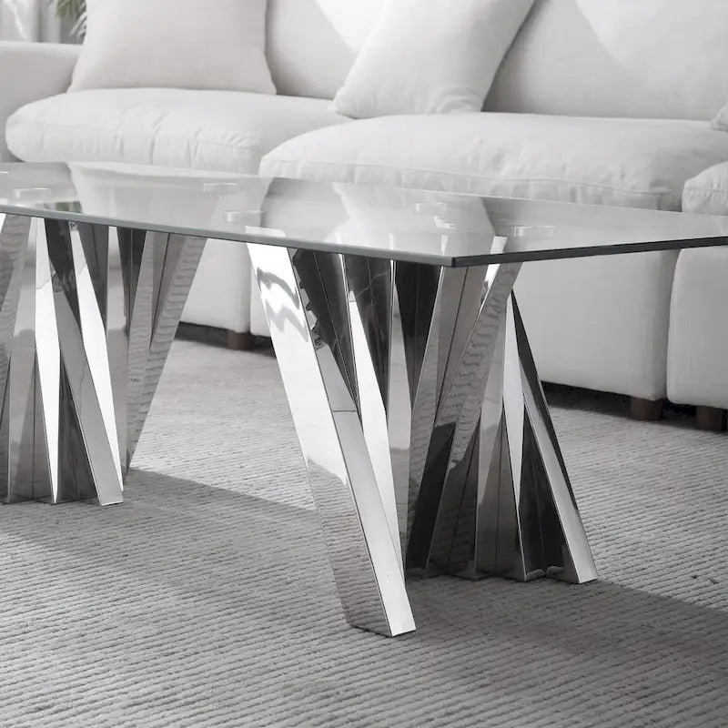 Table basse avec plateau en verre trempé et piètement en acier inoxydable finition miroir doré