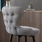 Chaises de bar modernes en tissu Leathaire hauteur comptoir, pivotantes, avec dossier capitonné et garniture cloutée dorée, lot de 2